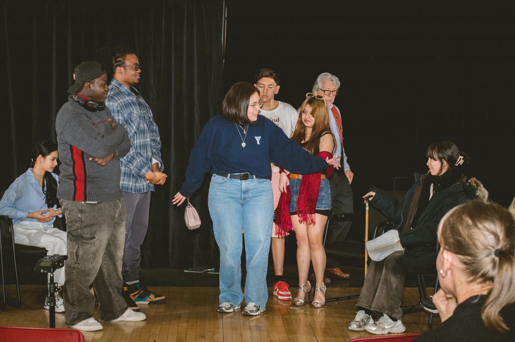 Youth on stage performing in an MCT production.